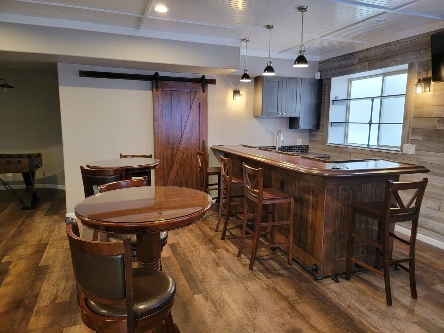 Finished basement living space by Fortune Homes